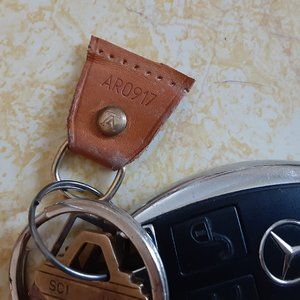 Leather Keyring Tag with "LV" Brass Stud Date Code